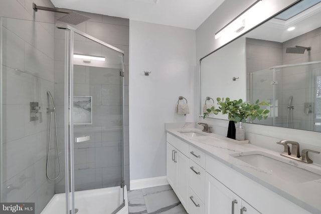 bathroom with vanity and walk in shower