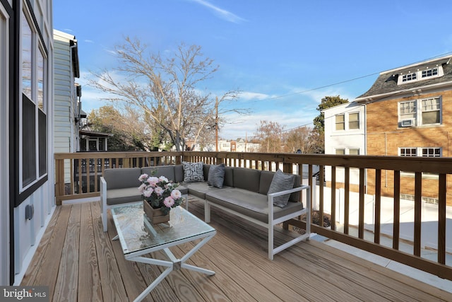 deck featuring an outdoor living space