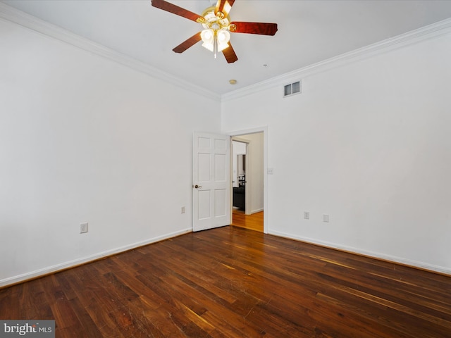 empty room with ceiling fan, crown molding, and dark hardwood / wood-style floors