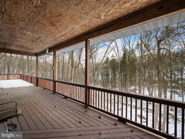 view of snow covered deck