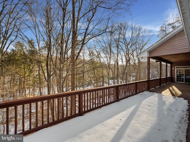 view of snow covered deck