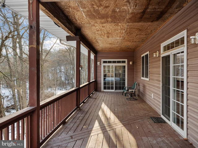 view of snow covered deck