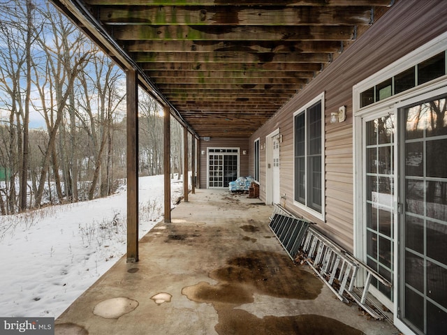 view of snow covered patio