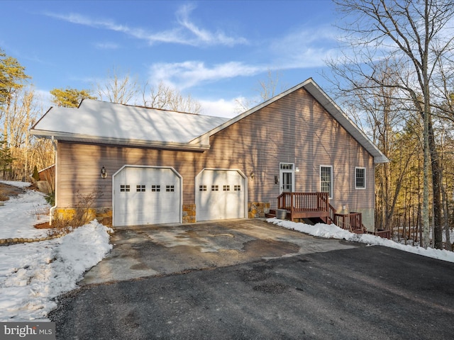 view of front of home featuring a wooden deck