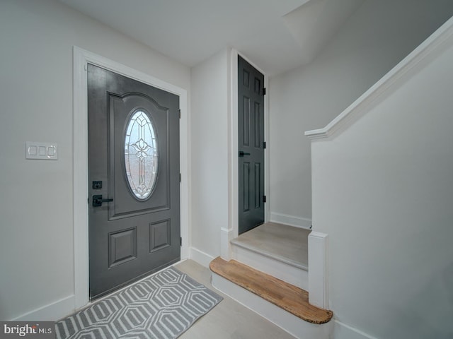 entrance foyer with light hardwood / wood-style floors