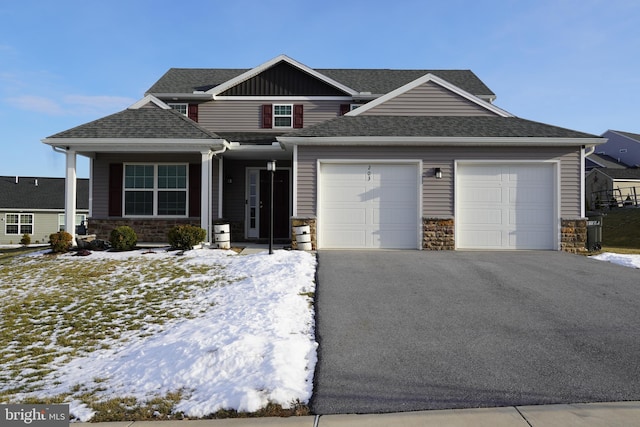 craftsman house with a garage