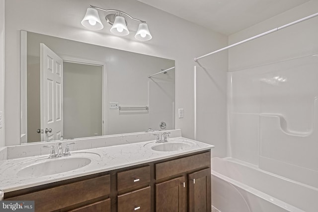 bathroom with  shower combination and vanity