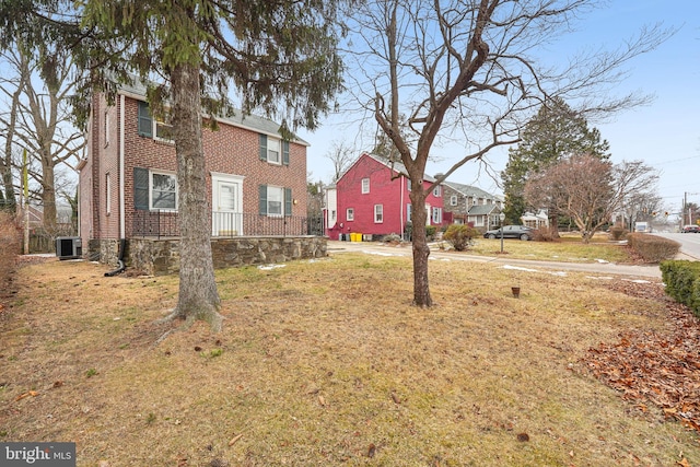 view of yard with central AC