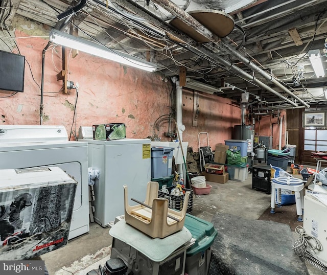 basement with washer and dryer and gas water heater