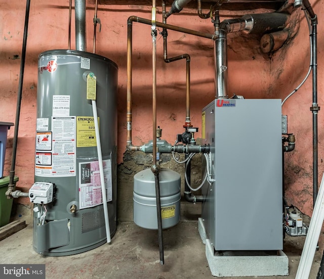 utility room with gas water heater