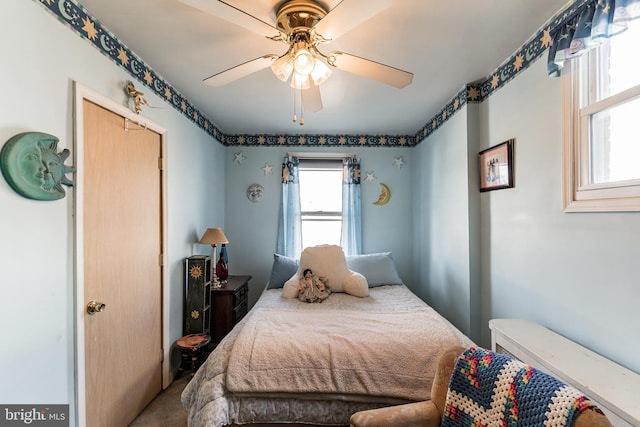 bedroom featuring ceiling fan