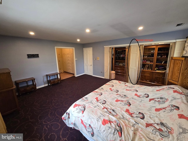 bedroom featuring dark carpet