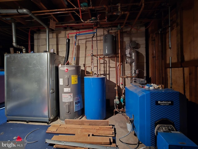 utility room featuring water heater