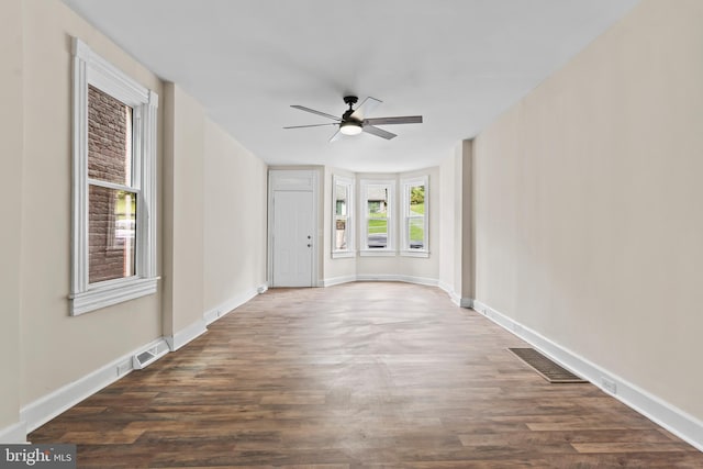 foyer featuring dark hardwood / wood-style floors and ceiling fan