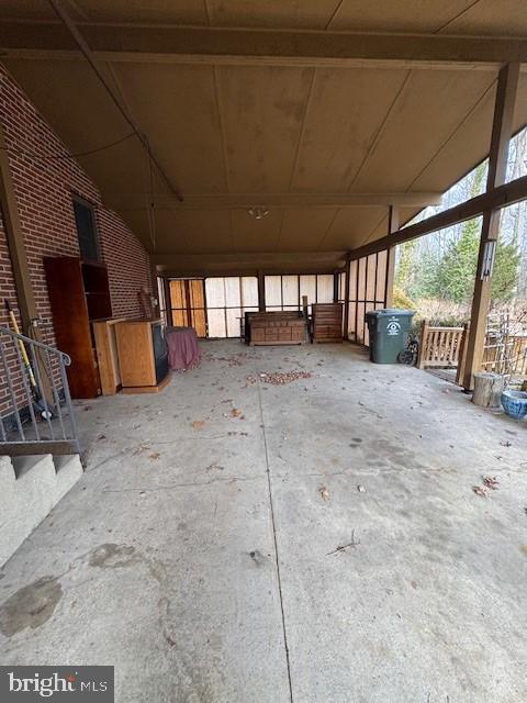 view of patio / terrace with an exterior structure and an outbuilding