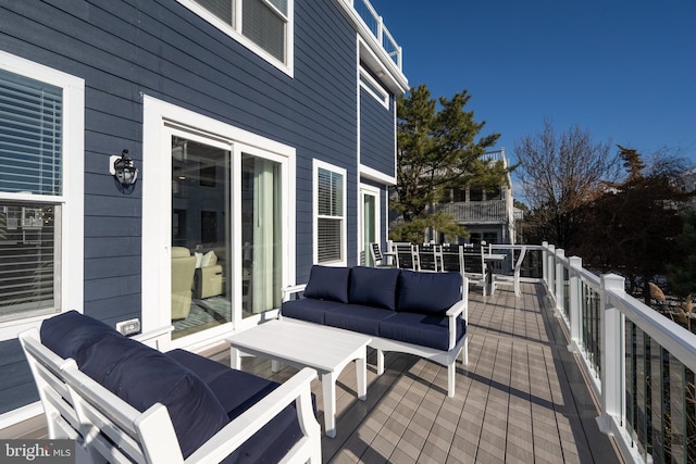 deck with outdoor lounge area