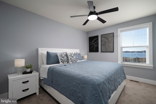 bedroom with carpet flooring and ceiling fan