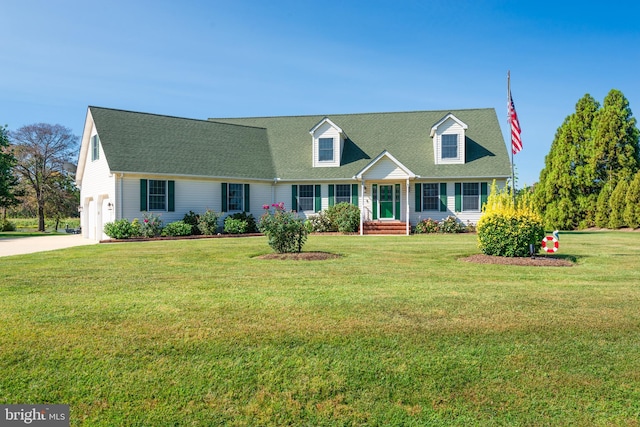 cape cod house with a front lawn and a garage