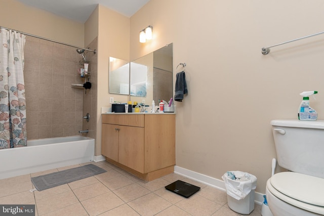 full bathroom featuring vanity, toilet, tile patterned floors, and shower / bath combo