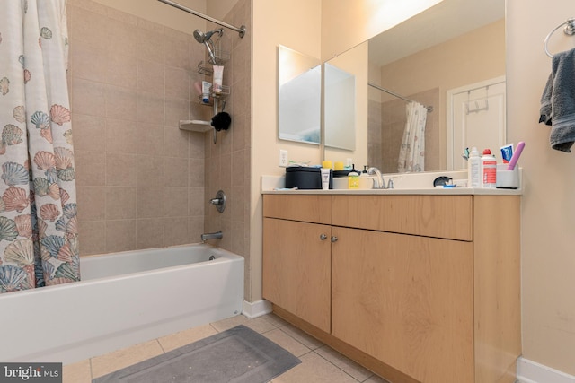 bathroom featuring vanity, tile patterned flooring, and shower / bath combination with curtain