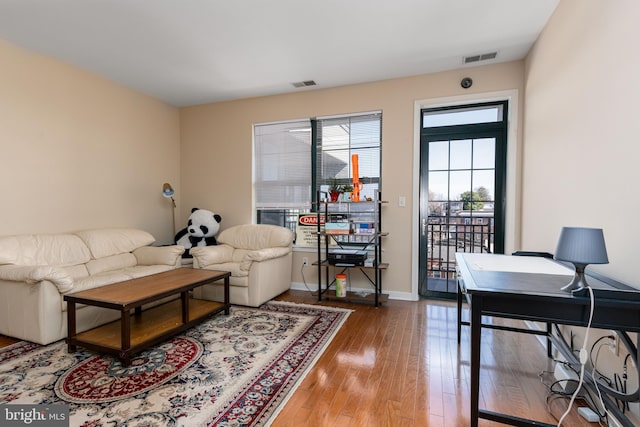 living room with wood-type flooring