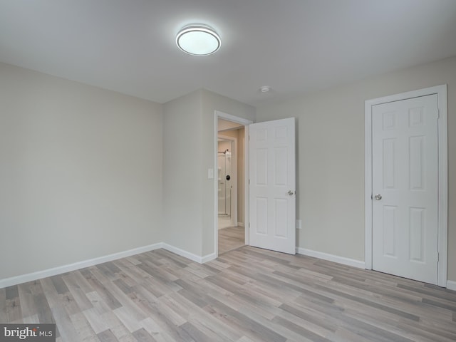 unfurnished bedroom featuring light hardwood / wood-style flooring