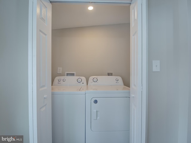 laundry area featuring washing machine and dryer