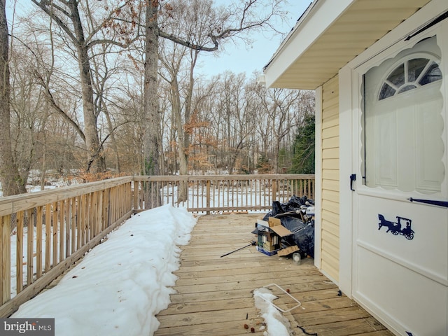 view of snow covered deck