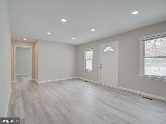 entrance foyer featuring light wood-type flooring