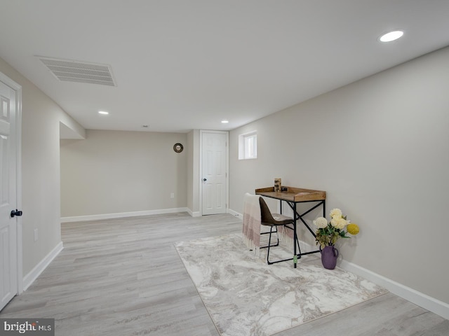 office area with light wood-type flooring