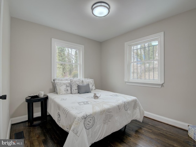 bedroom featuring dark hardwood / wood-style floors