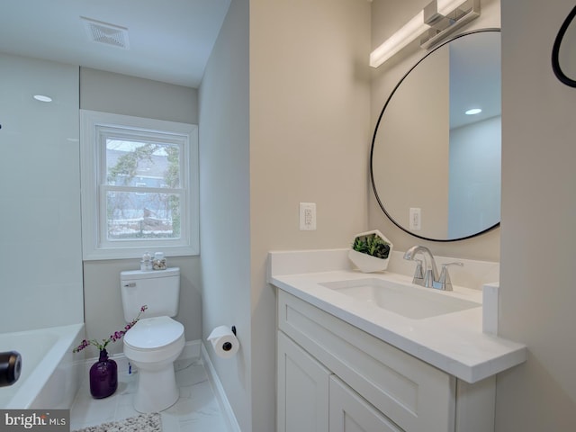 bathroom with vanity and toilet