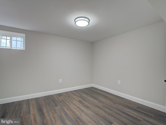 empty room featuring dark hardwood / wood-style floors