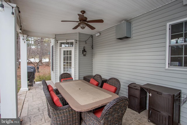 view of patio with grilling area and ceiling fan