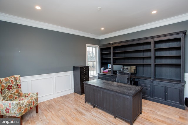 office space with ornamental molding and light hardwood / wood-style floors