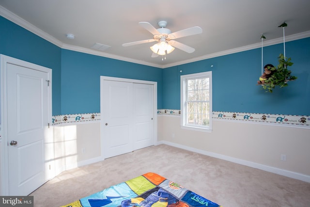 unfurnished bedroom with ceiling fan, light carpet, and ornamental molding