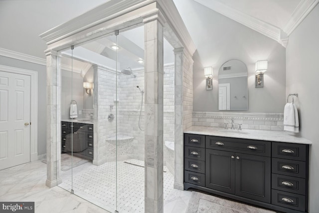 bathroom with vanity, an enclosed shower, and crown molding