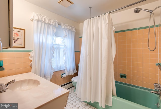 bathroom featuring visible vents, toilet, shower / bathtub combination with curtain, a baseboard heating unit, and tile walls