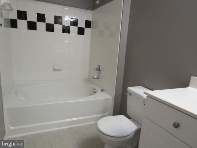 full bathroom with shower / bathtub combination, toilet, vanity, and tile patterned flooring