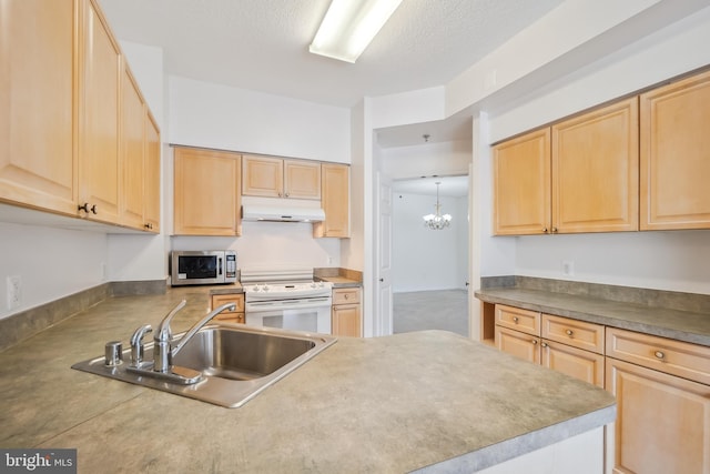 kitchen featuring light brown cabinetry, sink, a textured ceiling, and electric range