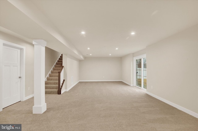 basement with light colored carpet