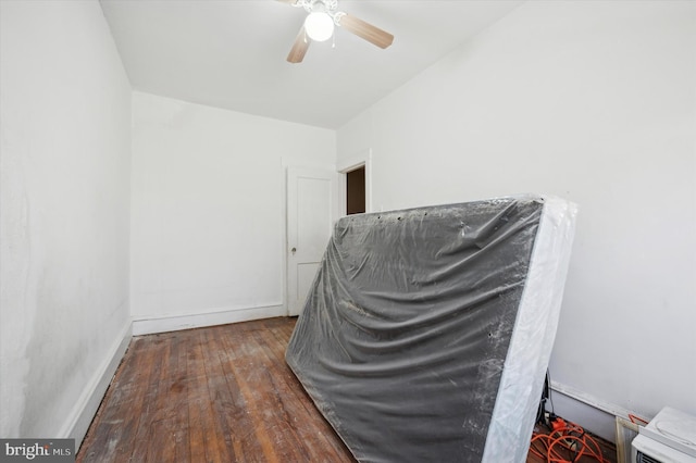 office featuring ceiling fan and dark hardwood / wood-style floors