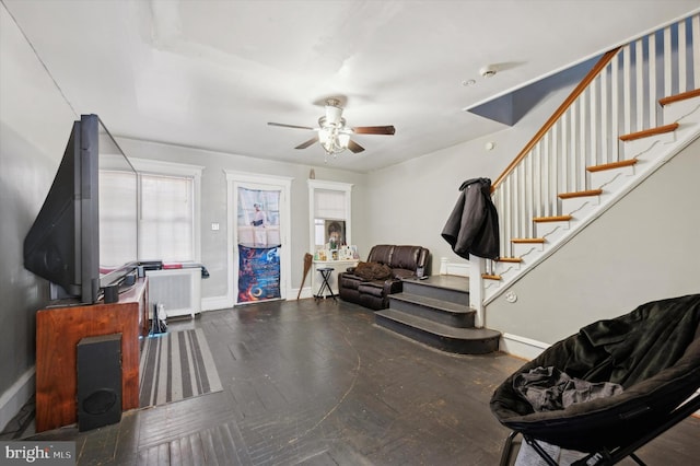 interior space featuring ceiling fan