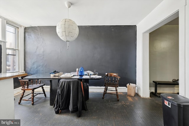 dining room with dark wood-type flooring