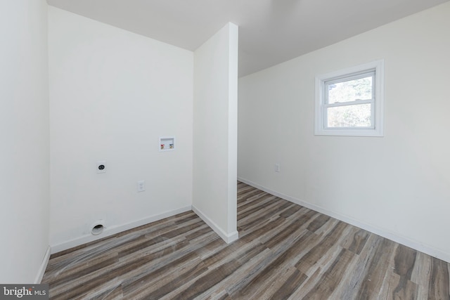 washroom with washer hookup, dark wood-type flooring, and electric dryer hookup