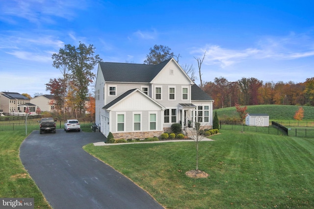 view of front of home featuring a front yard