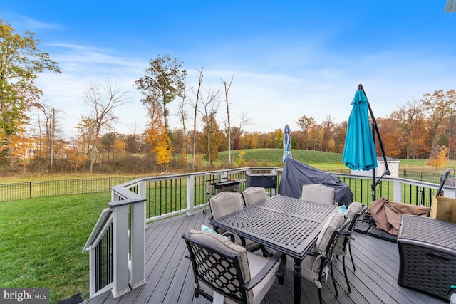 deck featuring a lawn