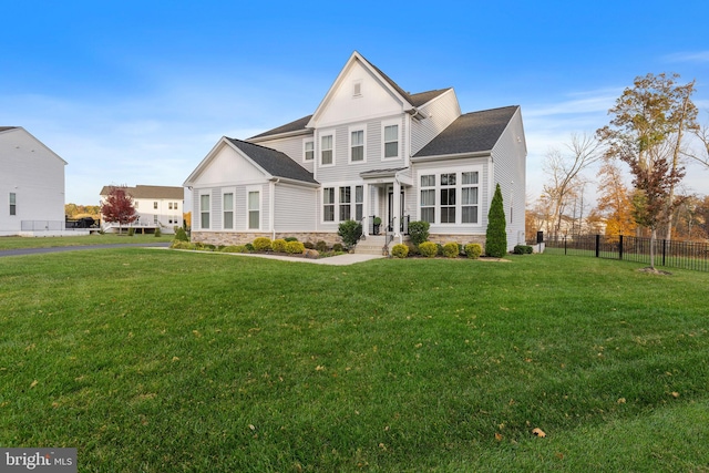 view of front of home with a front lawn