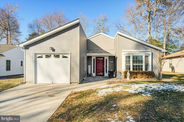 ranch-style home featuring a garage