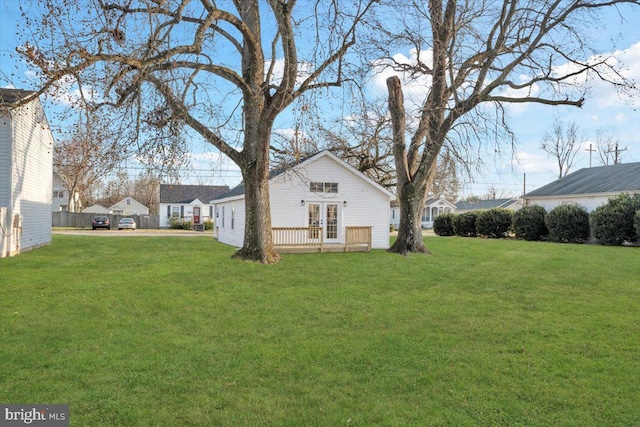 view of yard featuring french doors